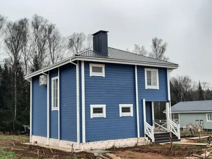 Дом из бруса с вальмовой крышей