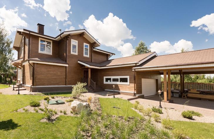 Коттедж из бессучкового клееного бруса